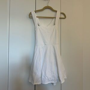 EXPRESS NWT Tennis Dress built in shorts with cross cross back in white